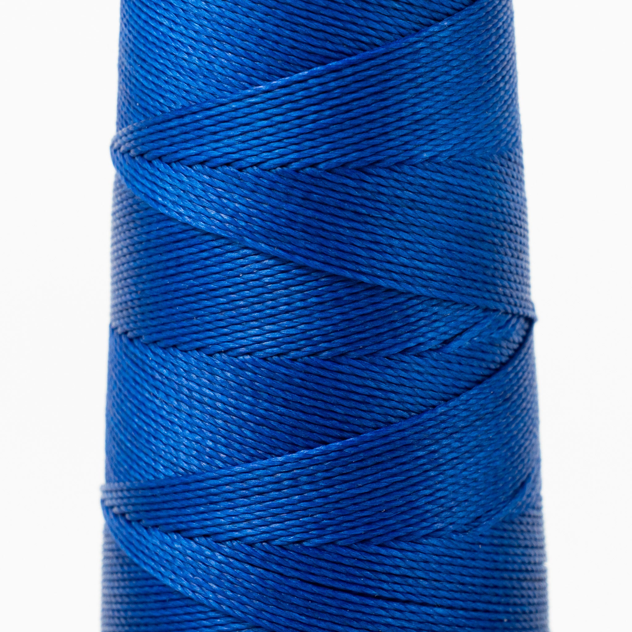 Close-up of MBT cerulean blue waxed polyester thread