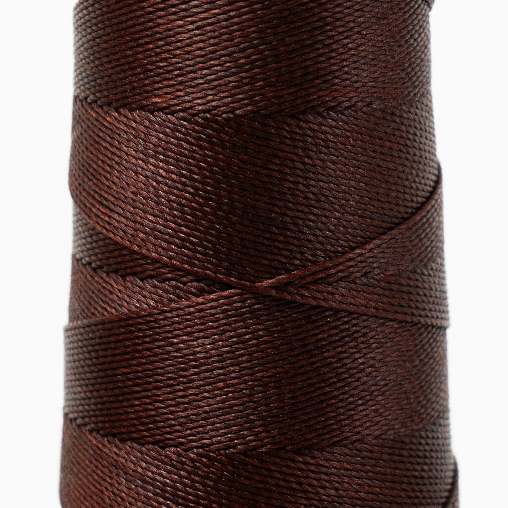 Close-up of MBT tuscan red waxed polyester thread