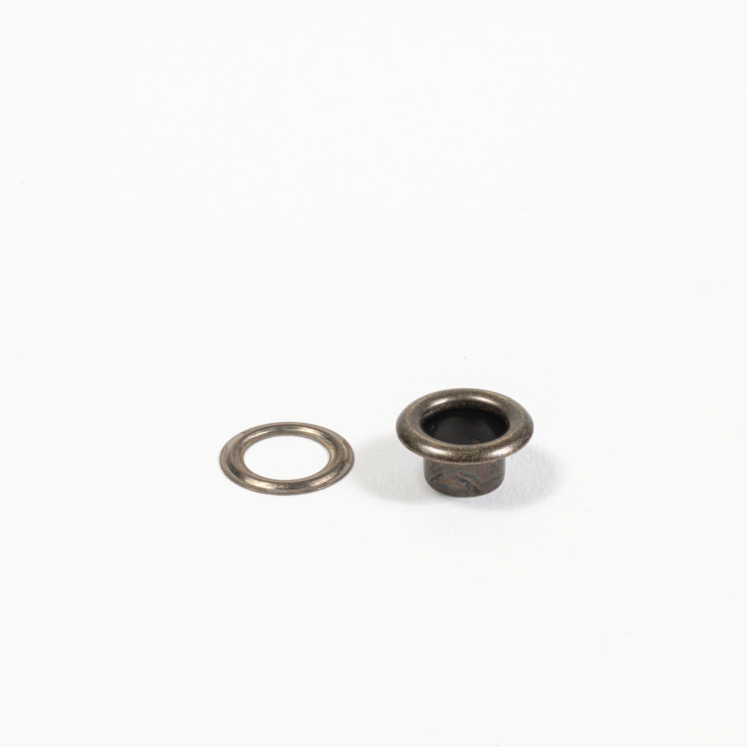 antique brass grommet set side view