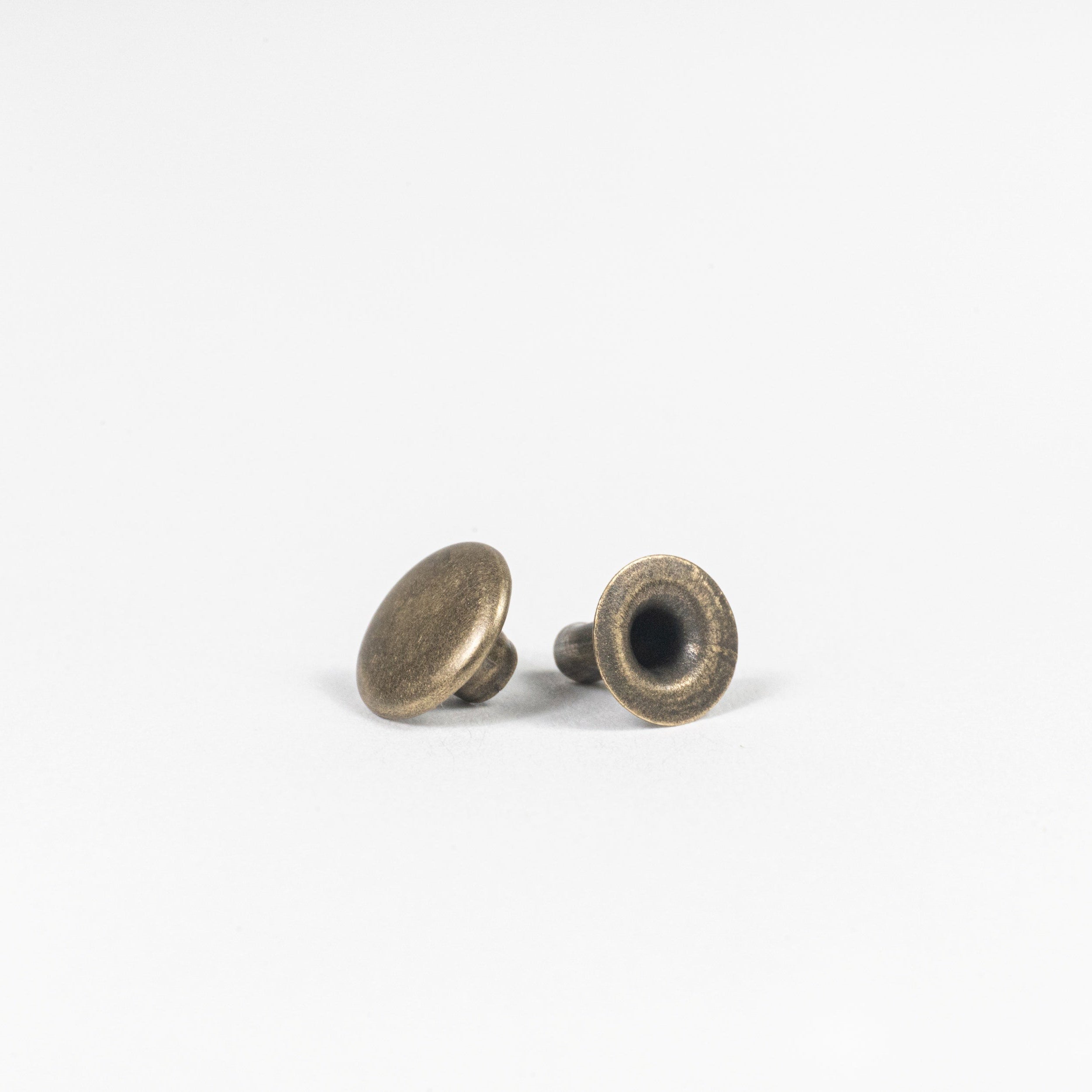 antique brass rapid rivet side angle view