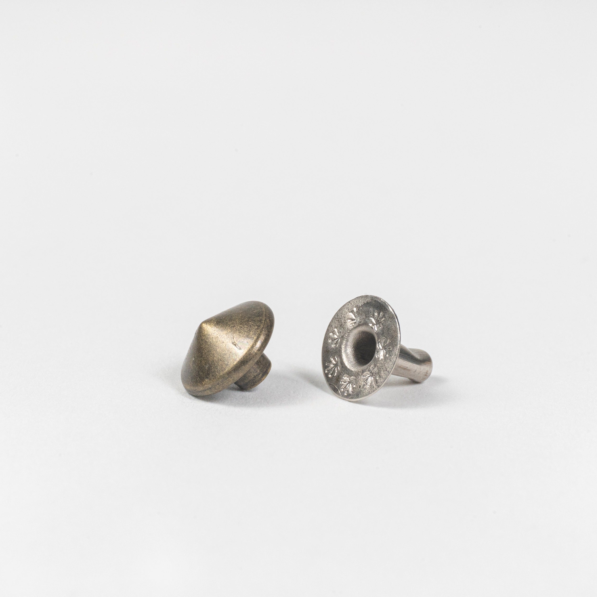 antique brass spike rivet angle view