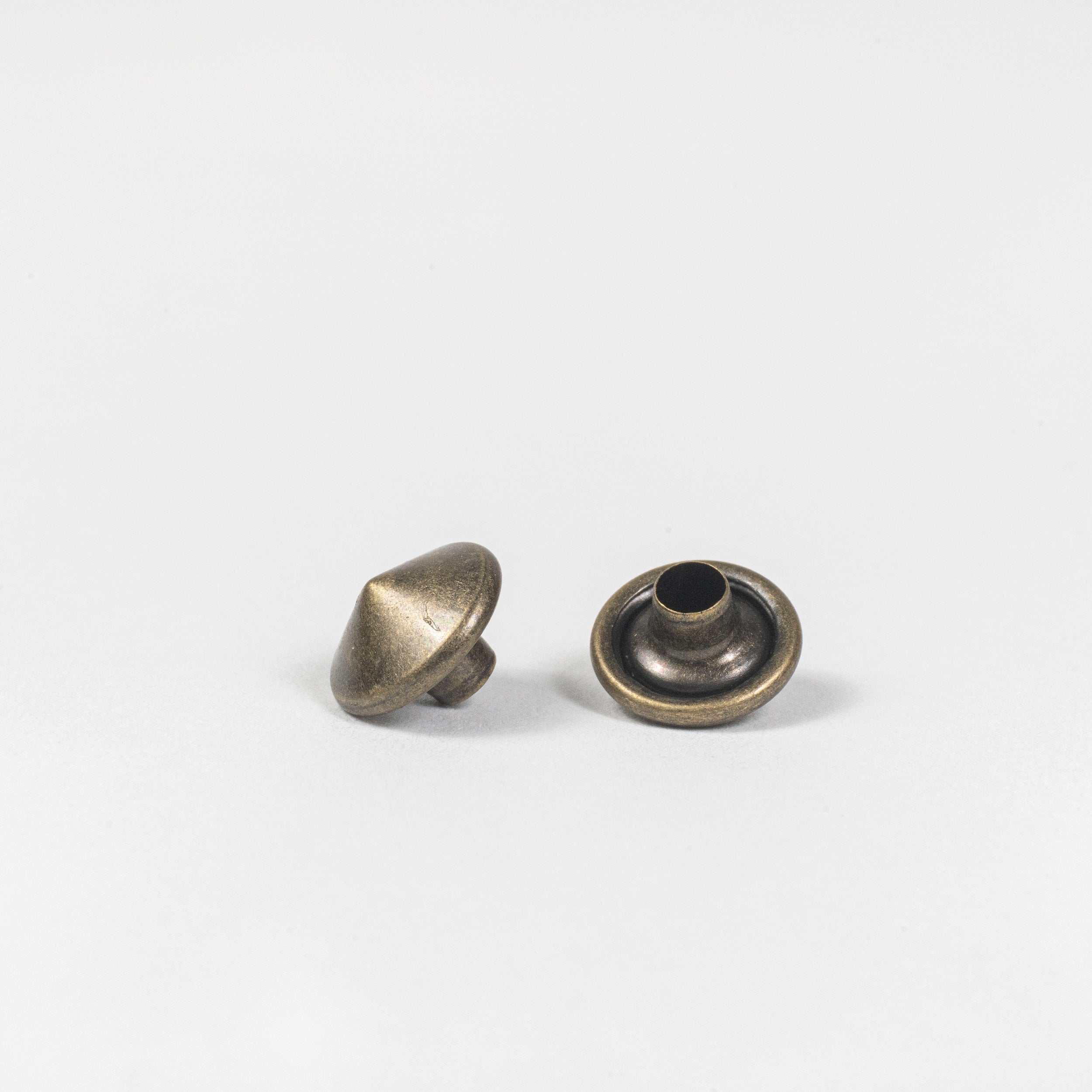 antique brass spike rivet cap front view