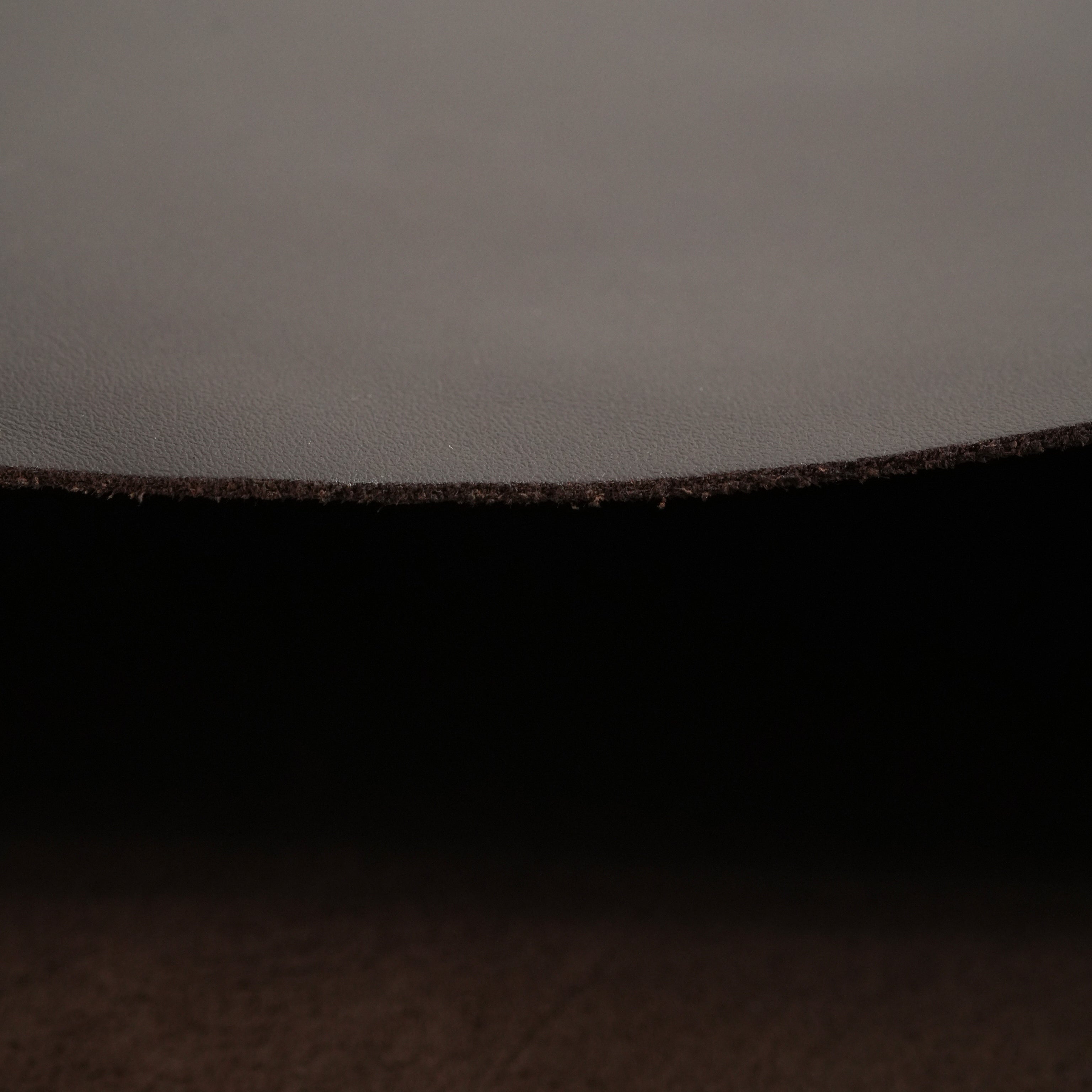 Edge view of brown-top-grain premium-italian leather