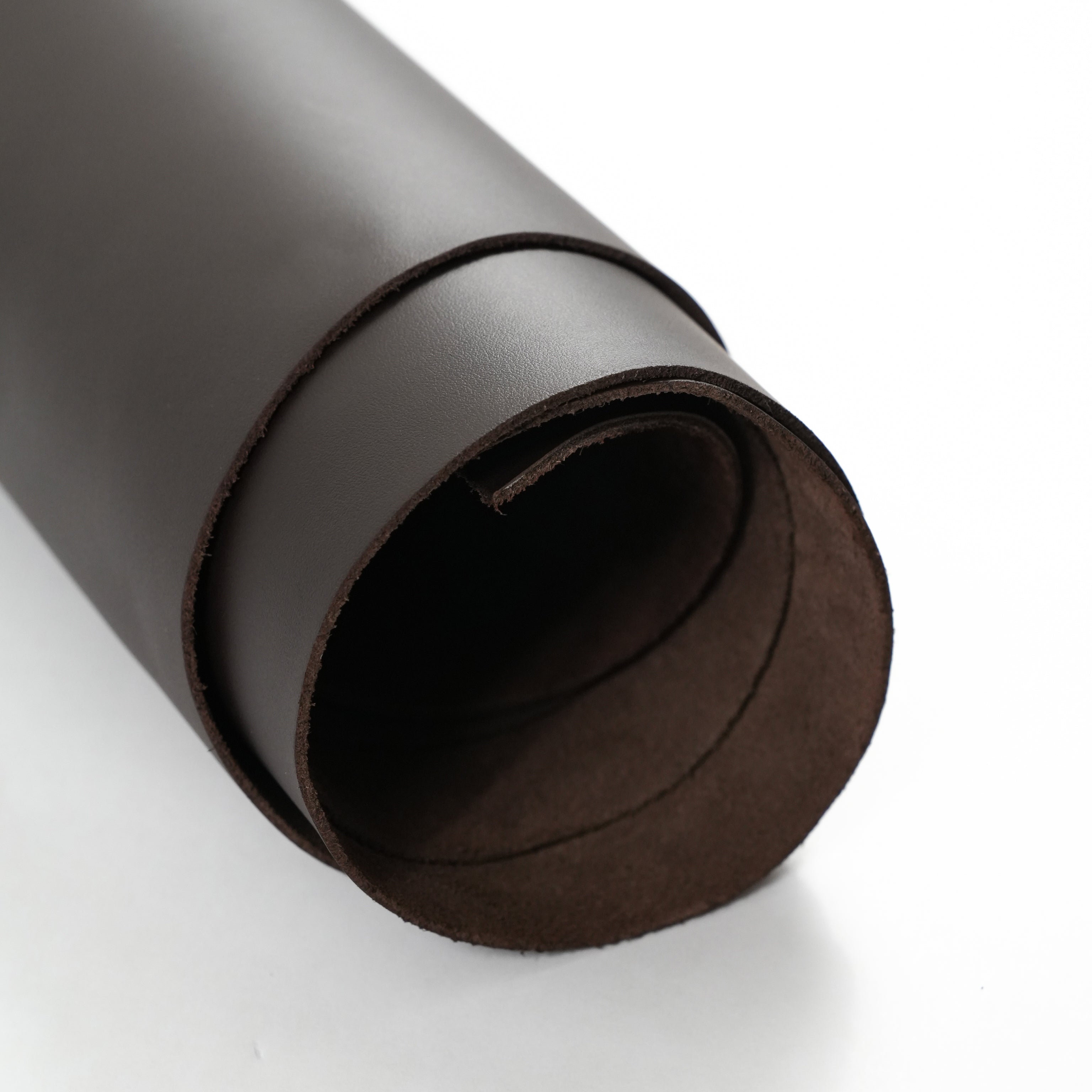 Brown top-grain premium italian leather hide rolled side view