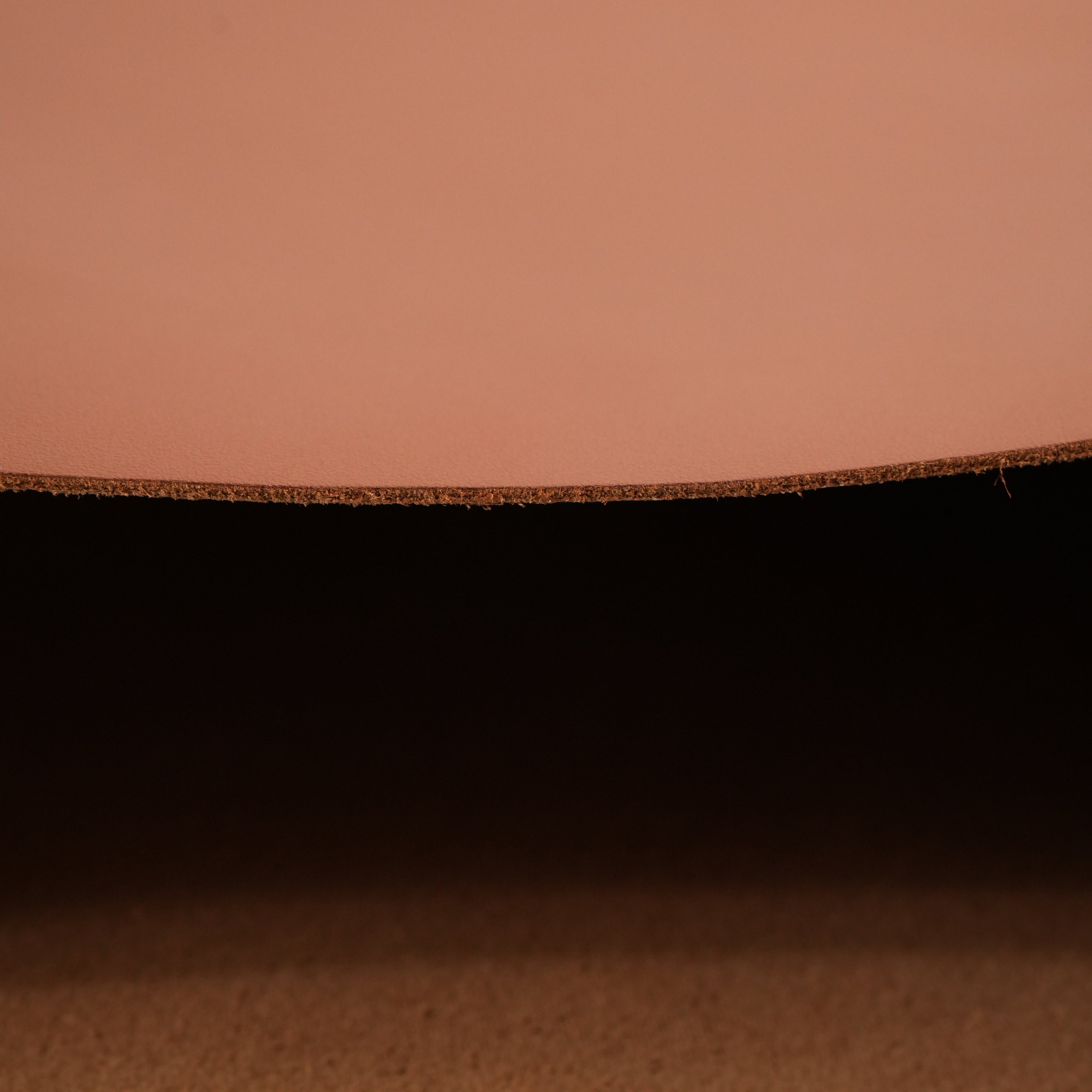 cognac brown top-grain premium italian leather edge close-up view