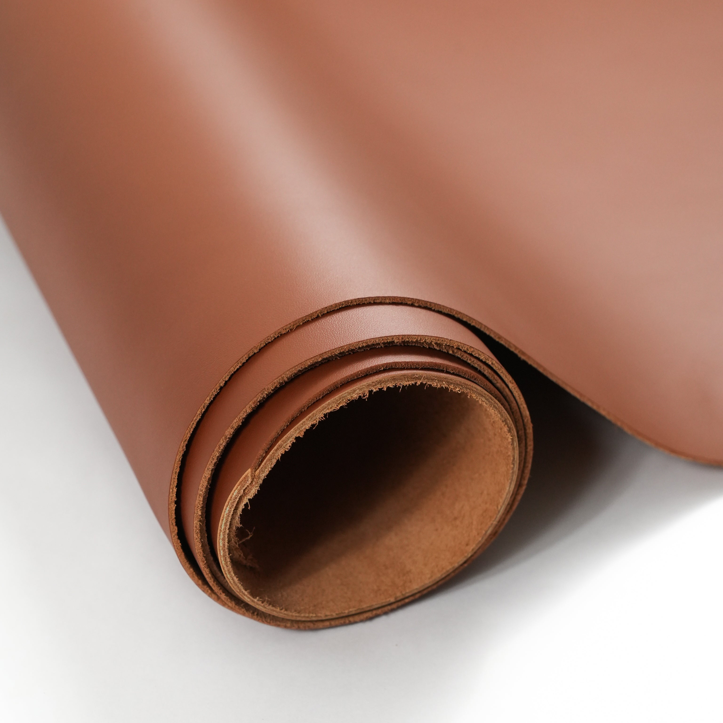 cognac brown top-grain premium italian leather partially unrolled view
