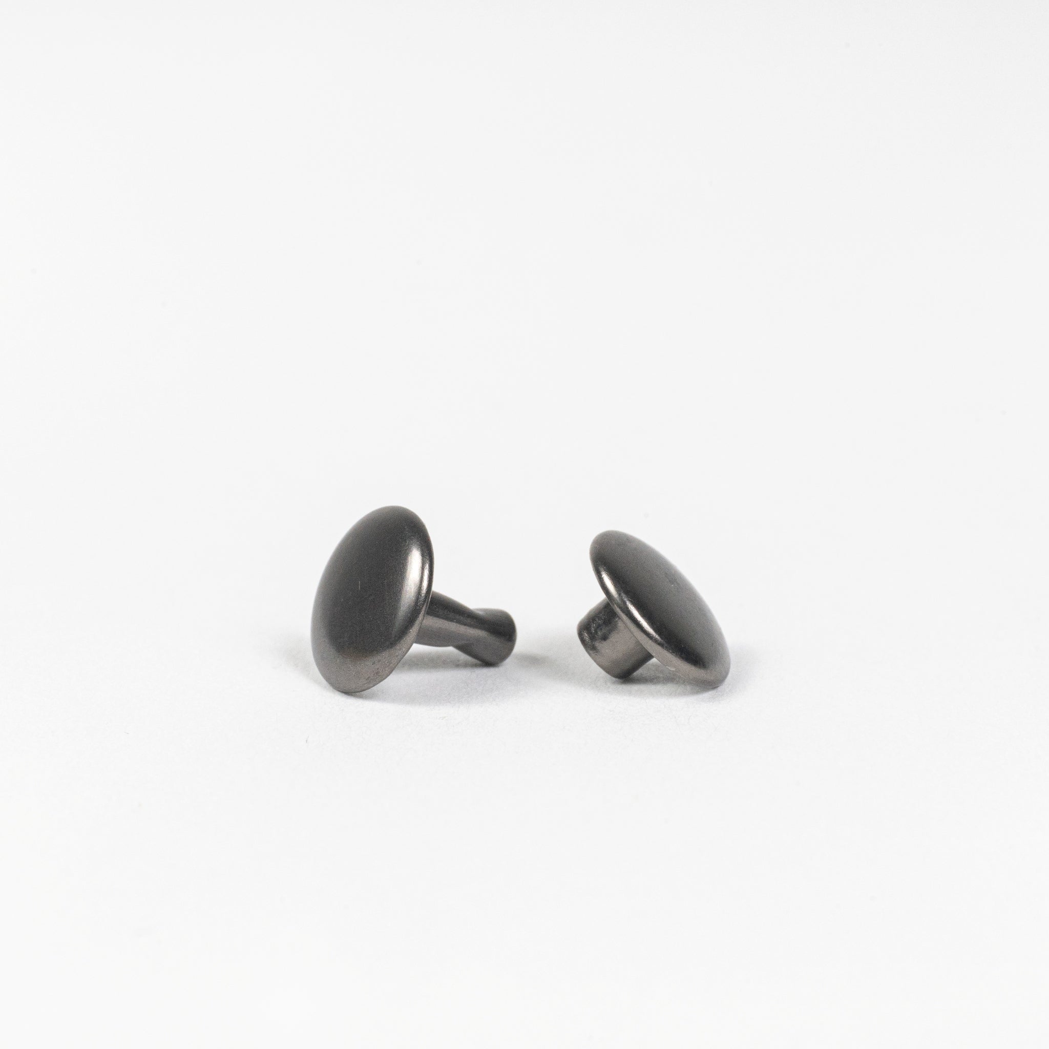 gunmetal double cap rivets side angle view