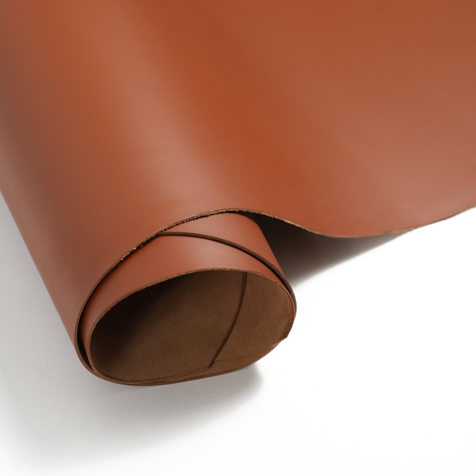  italian smooth leather sides cognac brown close-up flat lay texture