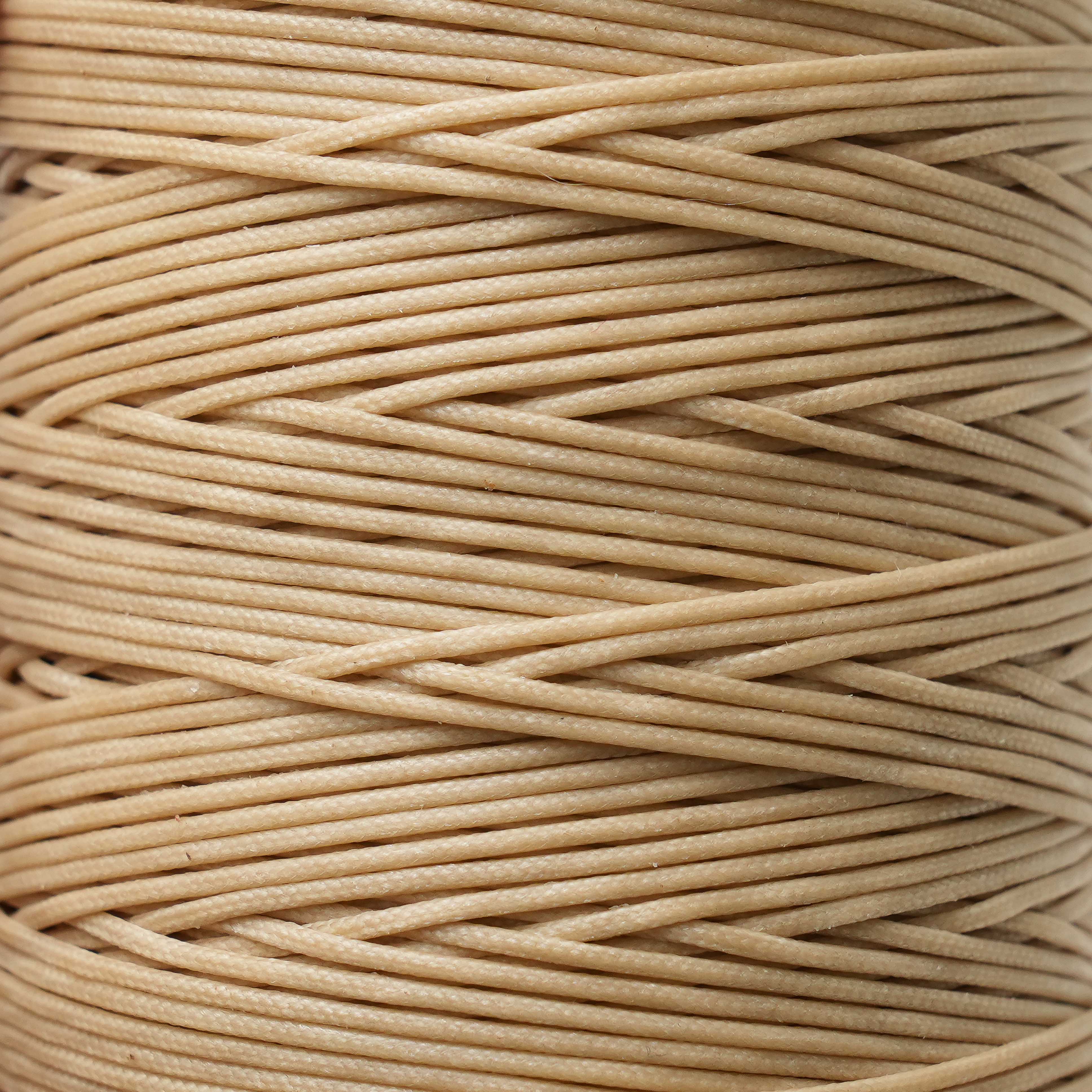 maine thread braided waxed cord spool beige close up view