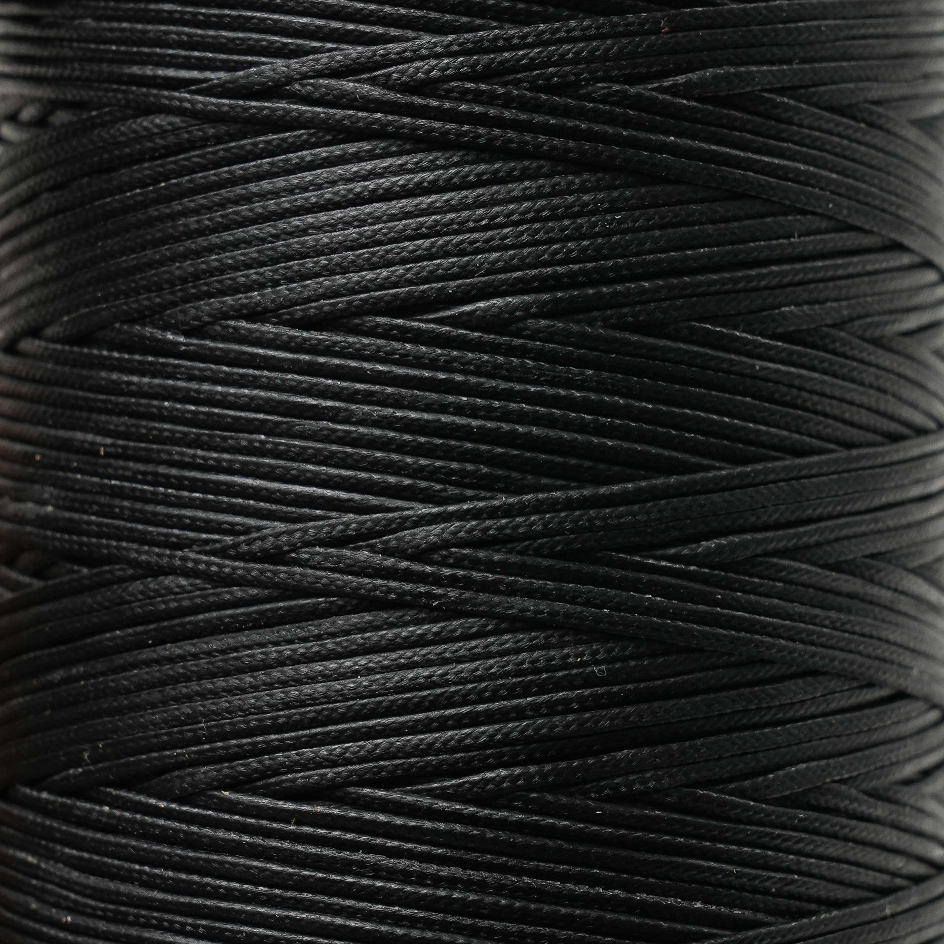 maine thread braided waxed cord spool black close up view