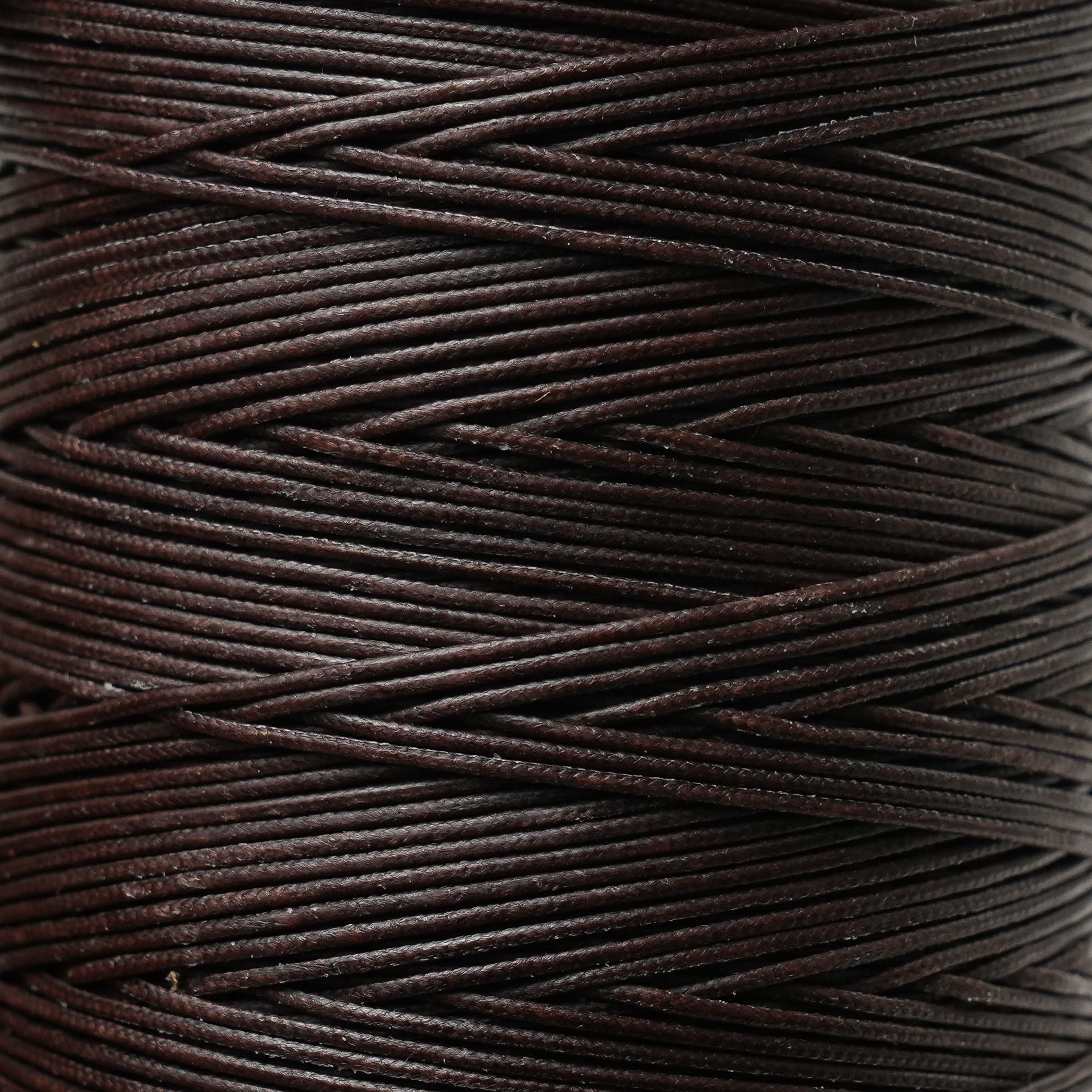 maine thread braided waxed cord spool brown close up view
