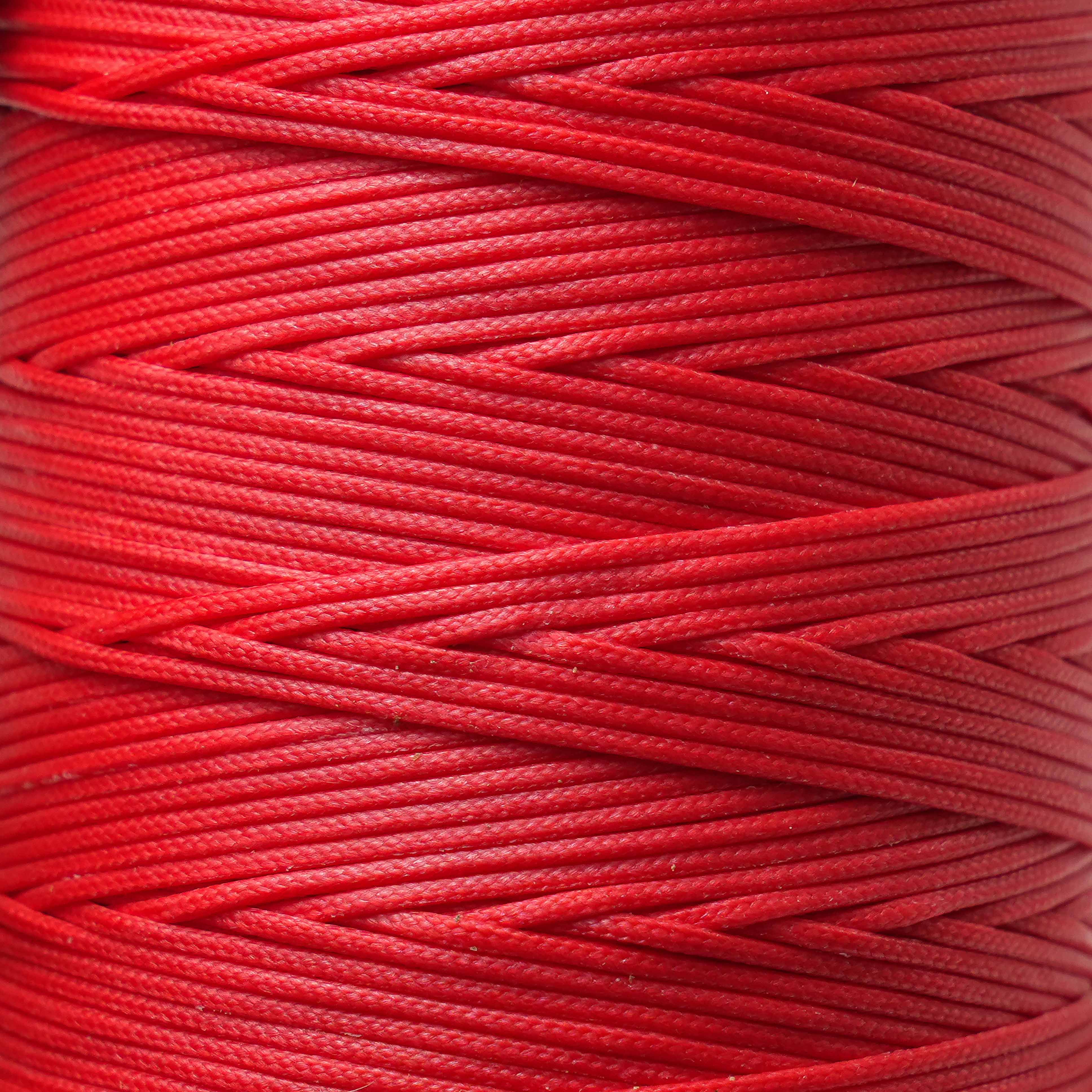 Close-up of fireball red string or thread