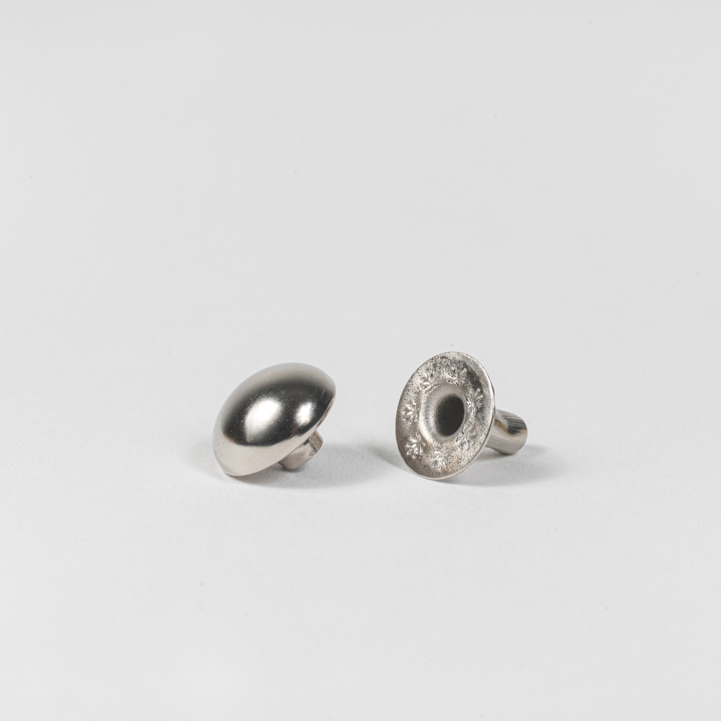 nickel plated domed rivet angle view