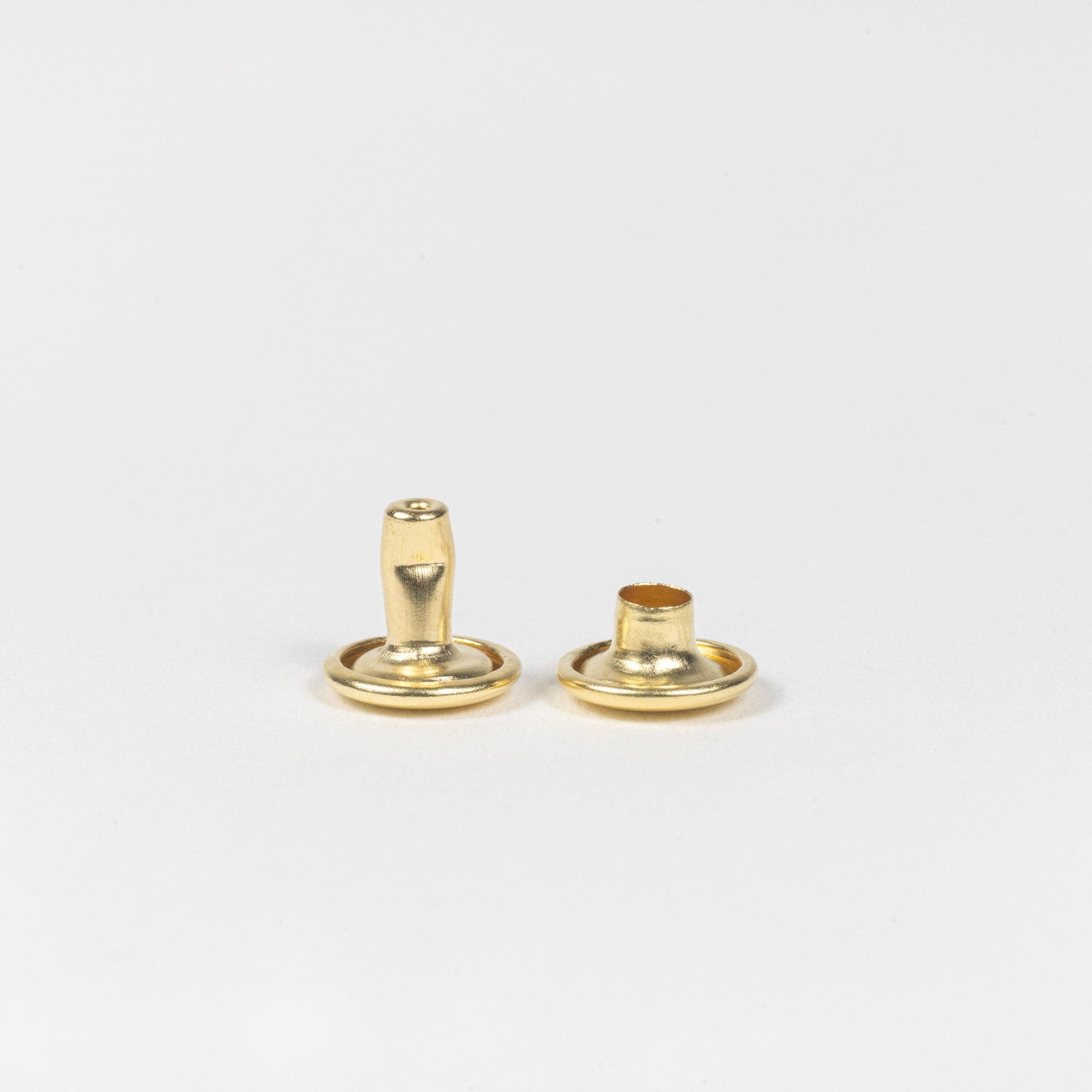 solid brass double cap rivet post view