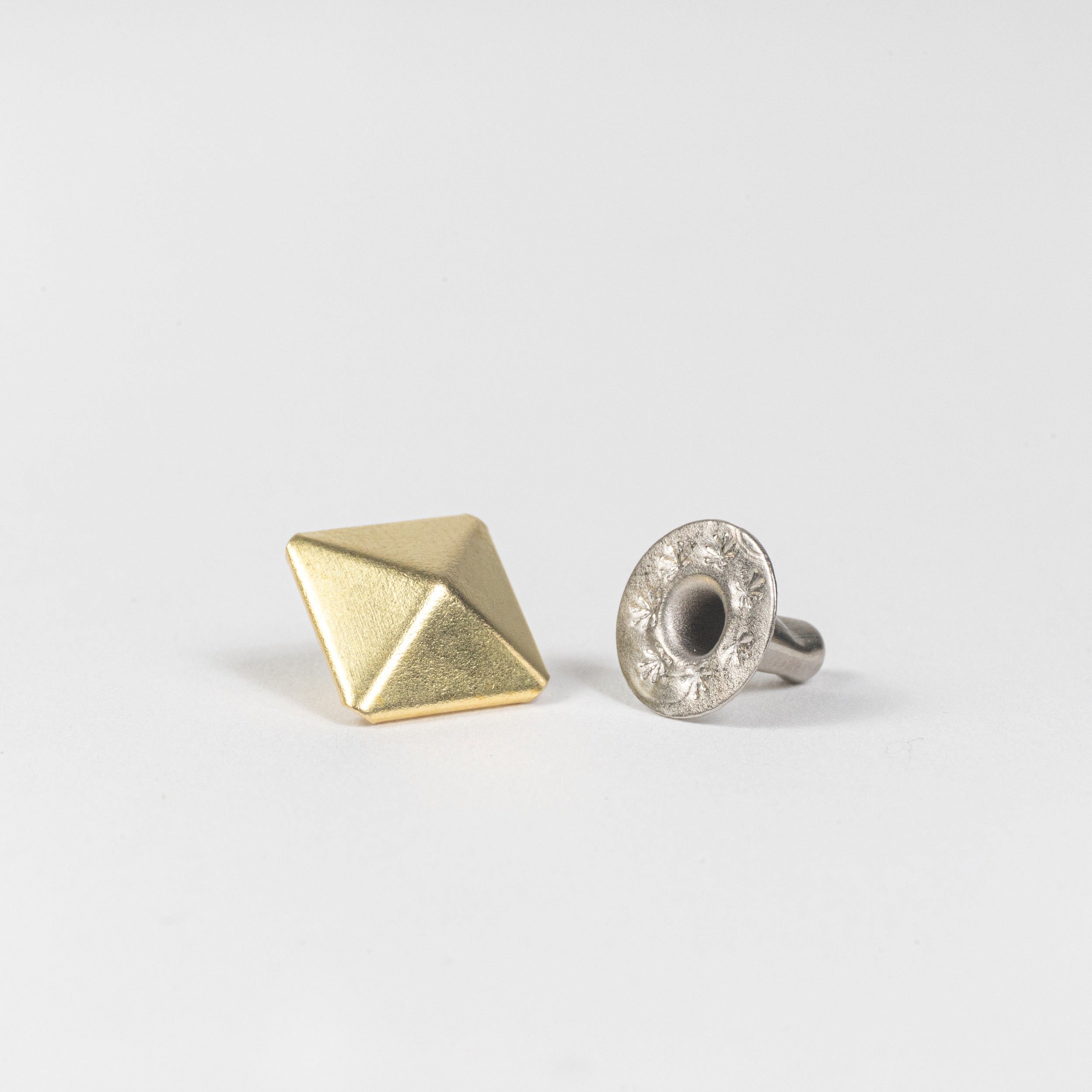 solid brass pyramid rivet angle view