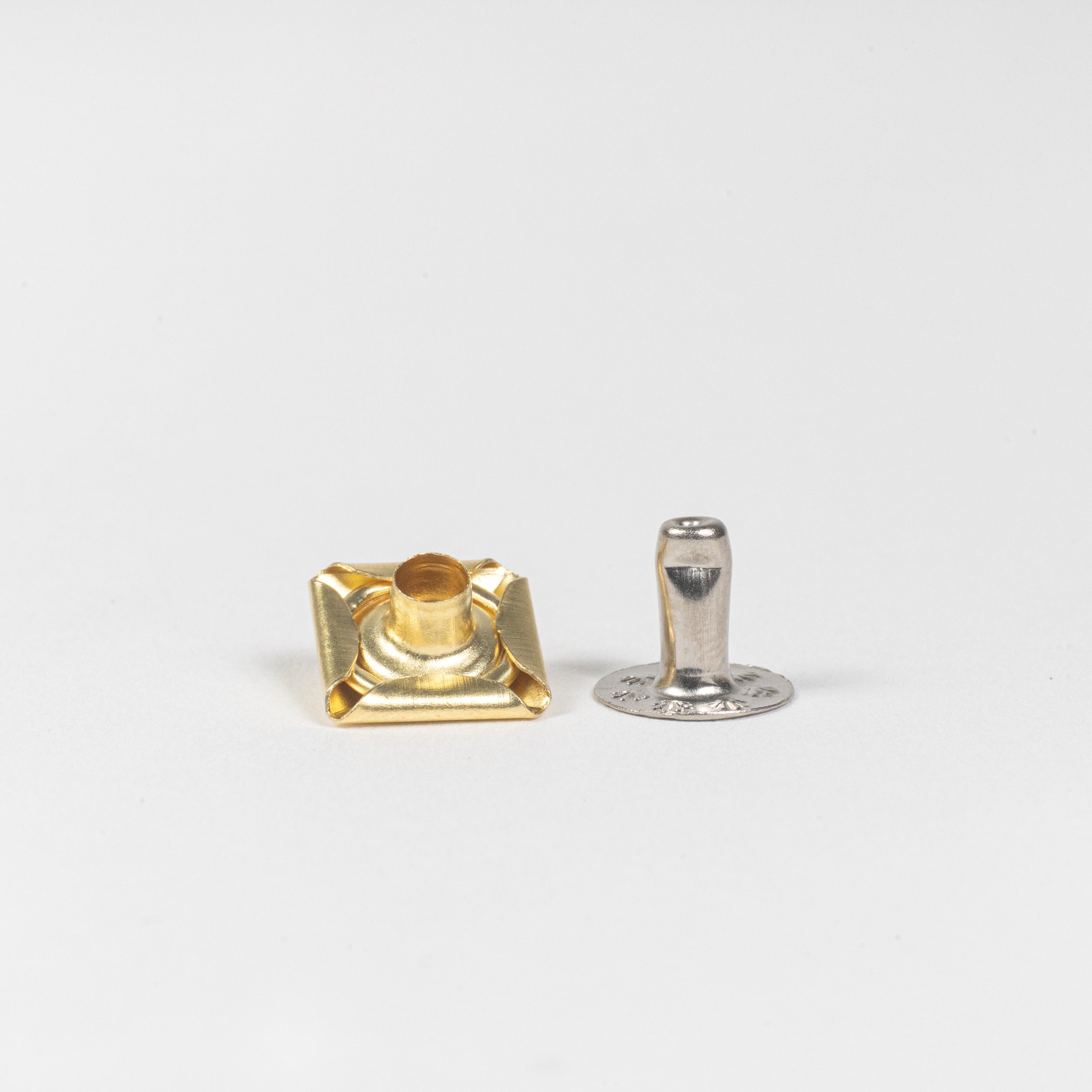 solid brass pyramid rivet front view