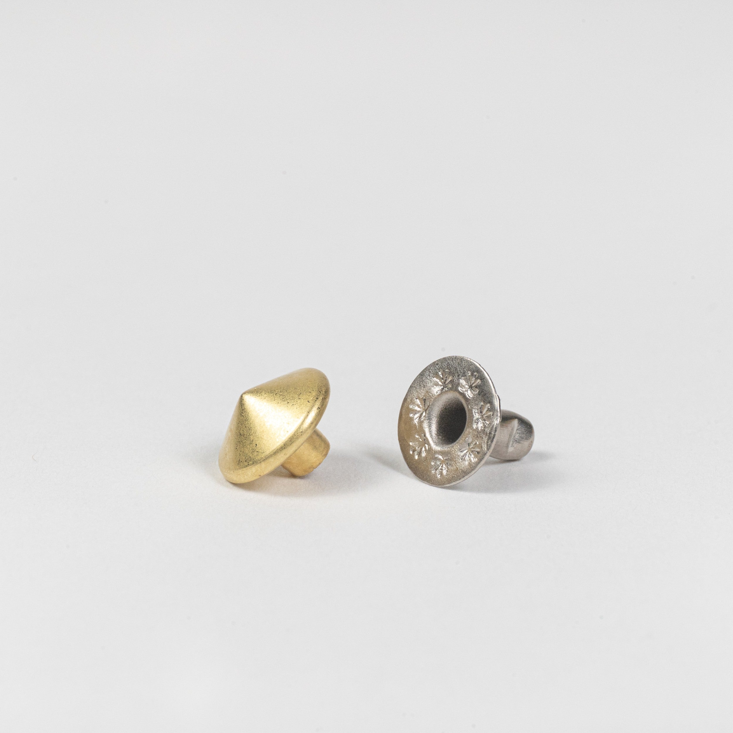 solid brass spike rivet angle view