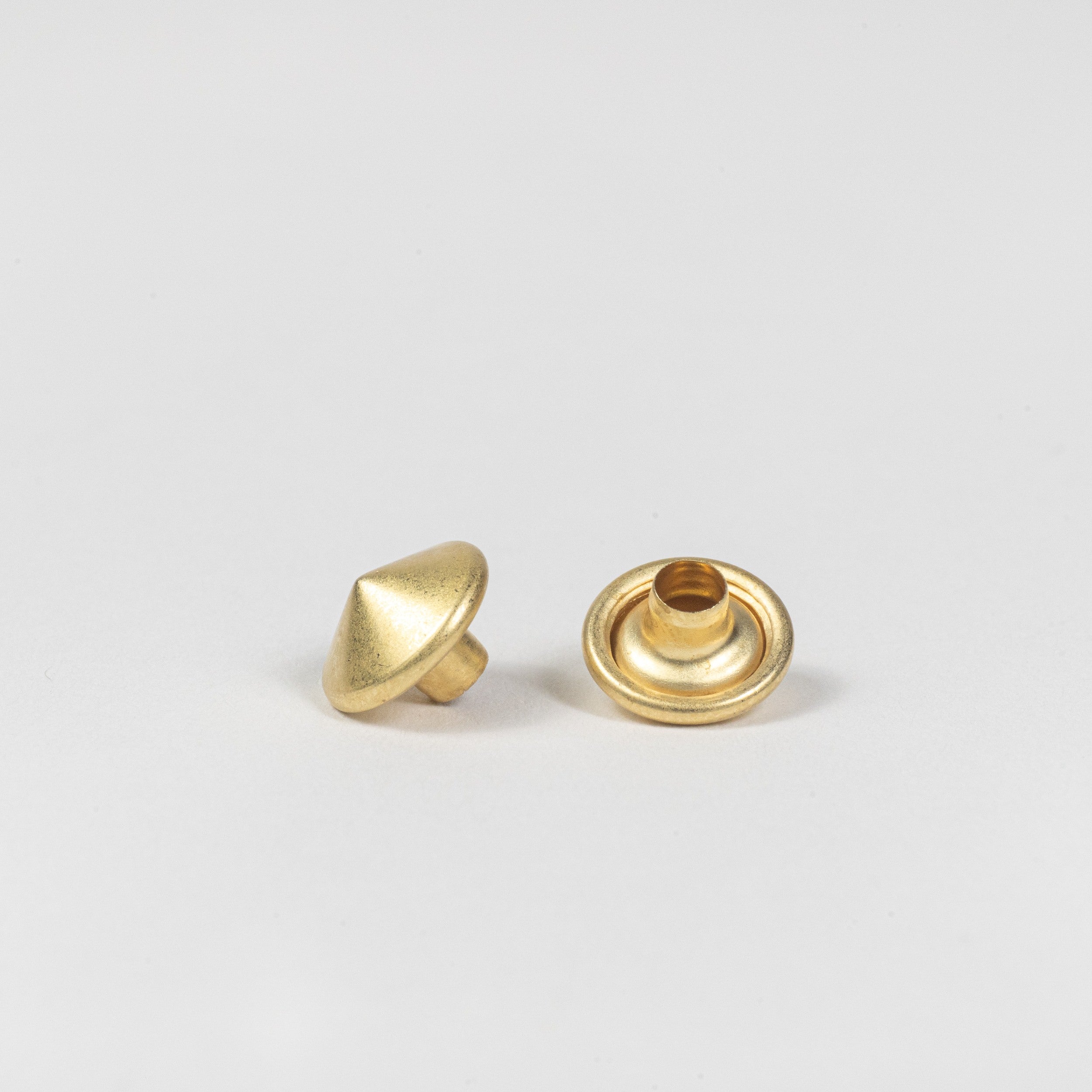 solid brass spike rivet cap front view