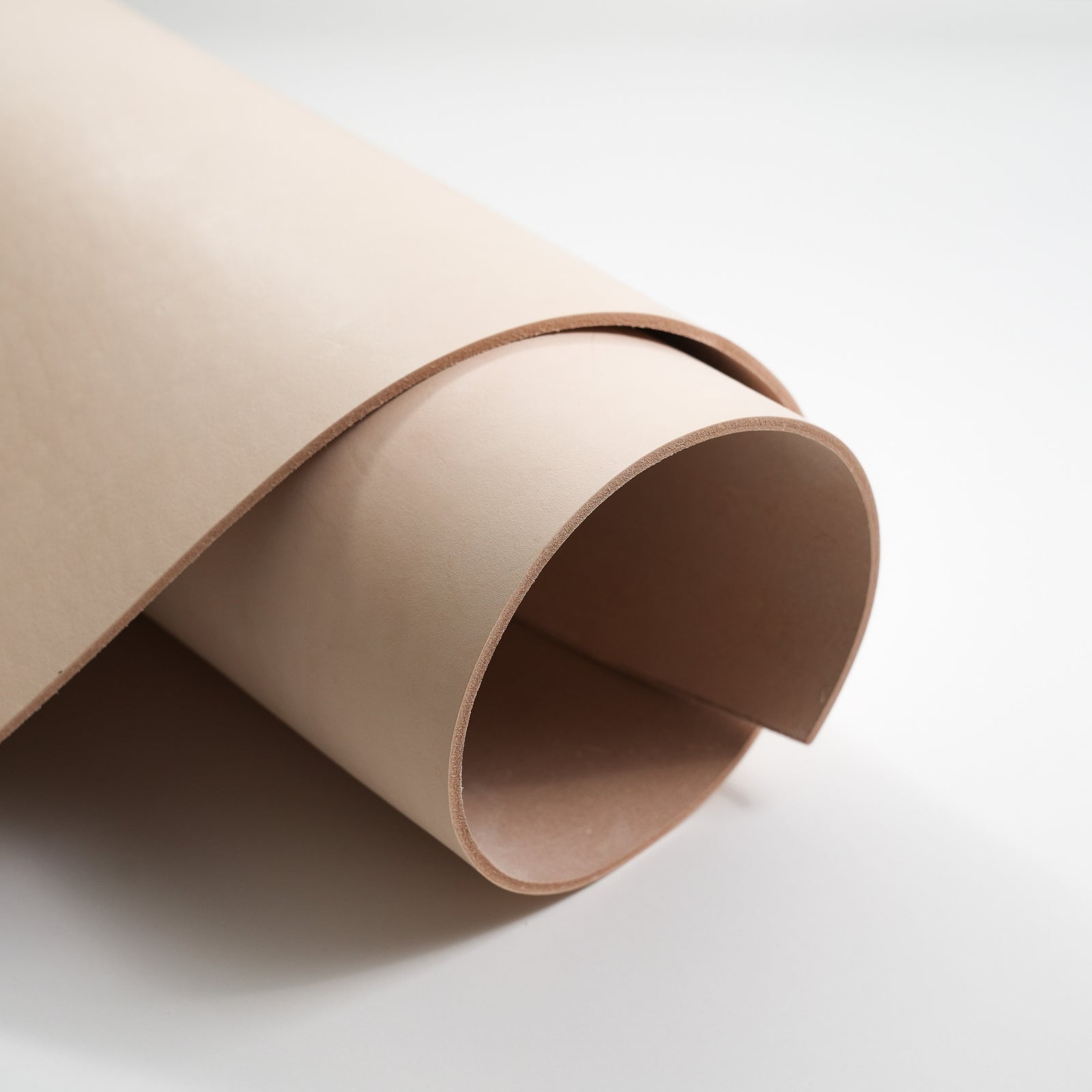 veg tan full grain cowhide leather rolled view