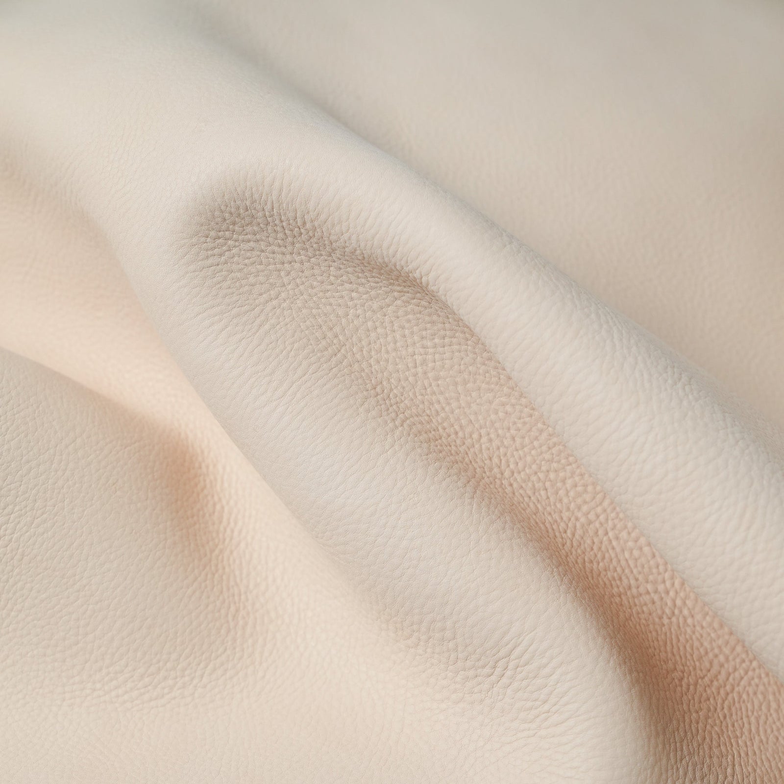 Milled natural vegetable tanned leather